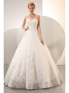 Beautiful A-line Sweetheart Beading Ball Gown Wedding Dress Floor-length Fabric With Rolling Flower