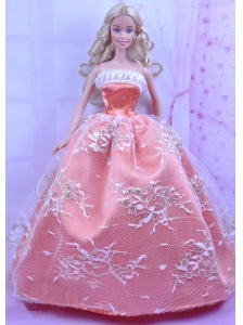 Luxurious Orange Dress With Appliques Made To Fit The Quinceanera Doll
