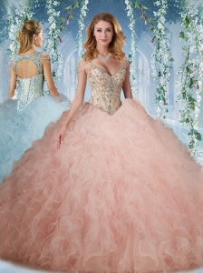 Unique Deep V Neck Peach Quinceanera Dress With Beading and Ruffles