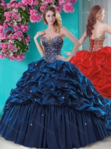 Unique Beaded and Ruffled Quinceanera Dress with Brush Train