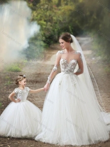 Feminine See Through Long Sleeves Wedding Dresses with Appliques and Lovely Big Puffy Flower Girl Dress with Hand Made Flowers