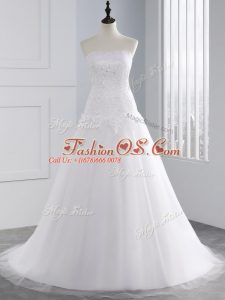 A-line Sleeveless White Bridal Gown Brush Train Lace Up