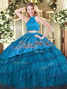 Teal Ball Gowns Halter Top Sleeveless Organza Floor Length Backless Beading and Embroidery and Ruffled Layers Quince Ball Gowns