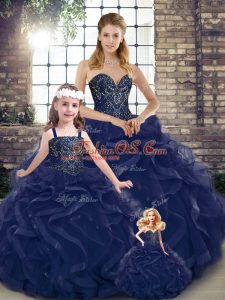 Sleeveless Tulle Floor Length Lace Up Ball Gown Prom Dress in Navy Blue with Beading and Ruffles