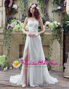 Modern White Sweetheart Lace Up Beading and Ruching Wedding Dress Brush Train Sleeveless