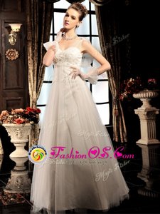 Captivating White Empire Tulle V-neck Sleeveless Beading Floor Length Lace Up Bridal Gown