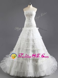 Captivating White Lace Up Wedding Gown Beading and Appliques and Ruffled Layers Sleeveless With Train Court Train