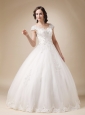 Unique Ball Gown V-neck Floor-length Organza and Satin Beading Wedding Dress