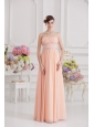 Peach Empire Strapless Prom Dress with Ruching and Beading,Silhouette: EmpireNeckline: StraplessWaist: FittedHemline/Train: Floor-lengthSleeve Length: SleevelessEmbellishment: Ruching,Beading Back Detail: Zipper-upFully Lined: YesBuilt-In Bra: YesFabric: ChiffonShown Color: Peach(Color & Style representation may vary by monitor.)Occasion: Prom, Formal Evening, Celebrity, GraduationSeason: Spring, Summer, Fall
