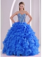 Exquisite Sweetheart Full -length 2014 Summer 15 Quinceanera Gowns in Blue,Breathtaking in extreme, this strapless ball gown is sure to get you noticed! Richly beading abounds the fitted bodice with refined boning details and modest sweetheart. An oversize rosette blooms along the top of the densely ruffled skirt, which flares boldly to the floor. A lace up corset style closure in the back secures the dress in place. There's just something about vintage-inspired gowns that no other style can duplicate.
