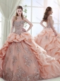 Elegant Brush Train Peach Quinceanera Gown with Appliques and Bubbles