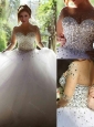 Luxurious See Through Beaded Bodice Wedding Dress with Long Sleeves