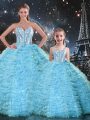 Sleeveless Tulle Floor Length Lace Up Ball Gown Prom Dress in Light Blue with Beading and Ruffles