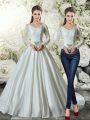 Custom Designed Satin Long Sleeves Bridal Gown Brush Train and Beading and Appliques