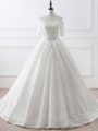 Affordable White Lace Up Bridal Gown Lace and Appliques Half Sleeves Brush Train