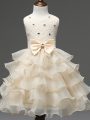 Latest Lace and Ruffled Layers and Bowknot Kids Pageant Dress Champagne Zipper Sleeveless Knee Length