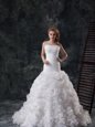 Fabric with Rolling Flowers White Sweetheart Neckline Ruffles and Ruching Wedding Gown Sleeveless Lace Up
